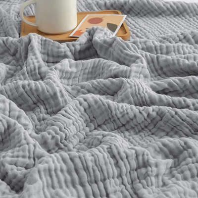 CozyHaven™ – Åndbart Musselin Tæppe